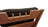 Appui-tête en bois naturel avec coussin en lin noir garni en kapok, déhoussable, lavable. Structure du fauteuil et de l'appui-tê