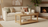 Table basse écologique en bois d'hévéa clair huilée dans un salon beige avec canapé et cheminée au décor naturel. Sans COV
